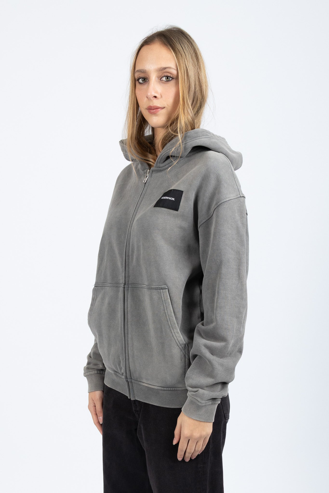 Axel Zip Up - Woven Badge