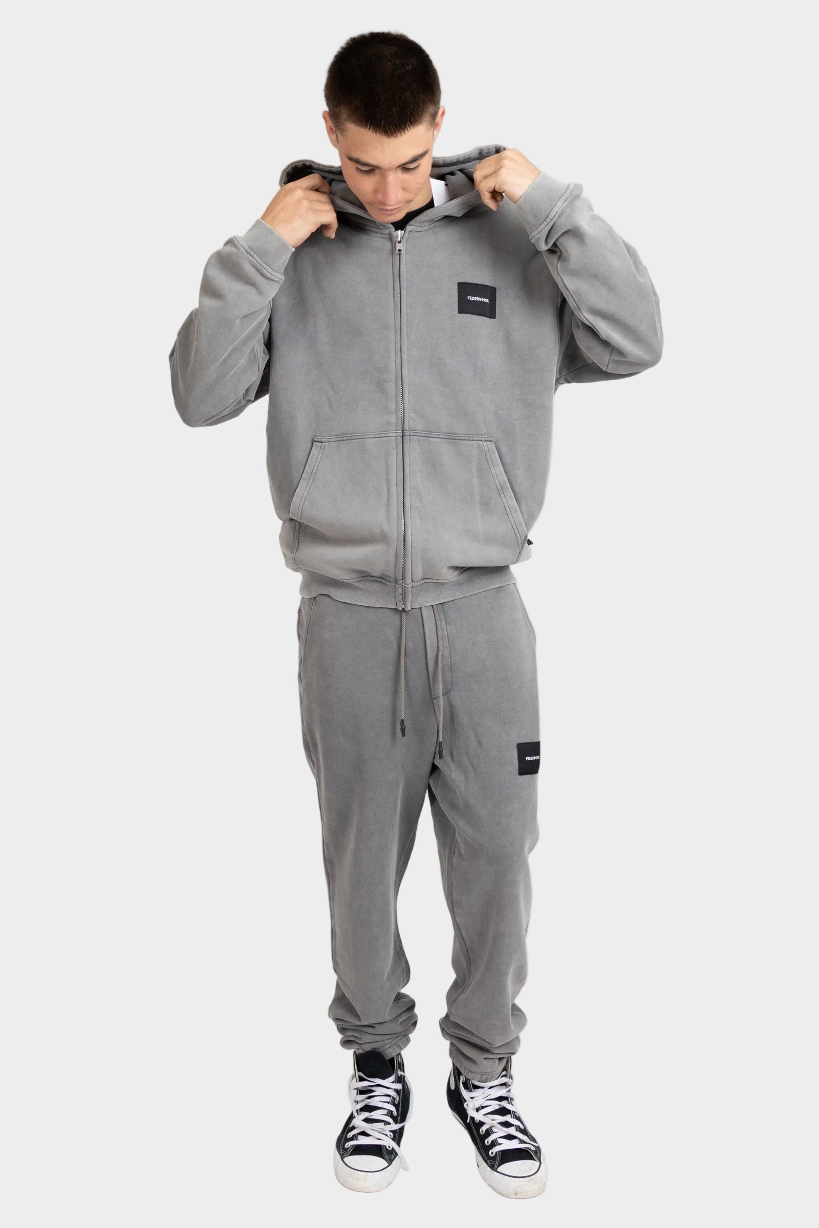 Axel Zip Up - Woven Badge