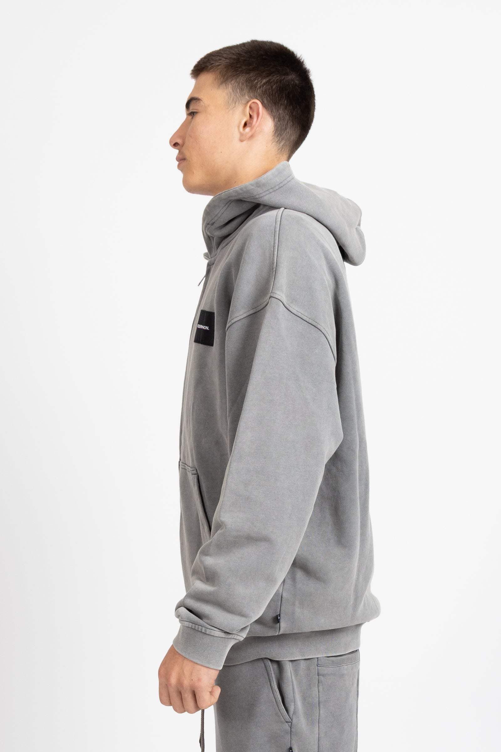 Axel Zip Up - Woven Badge