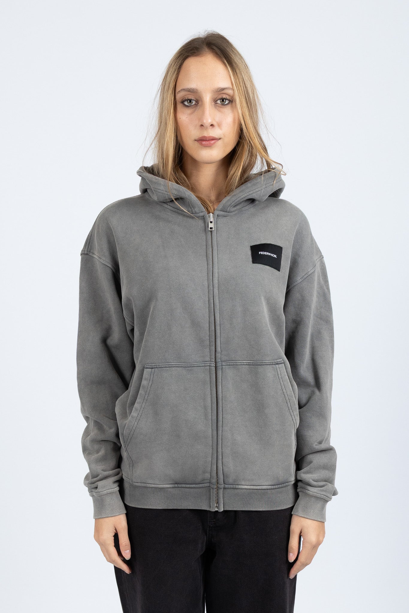 Axel Zip Up - Woven Badge