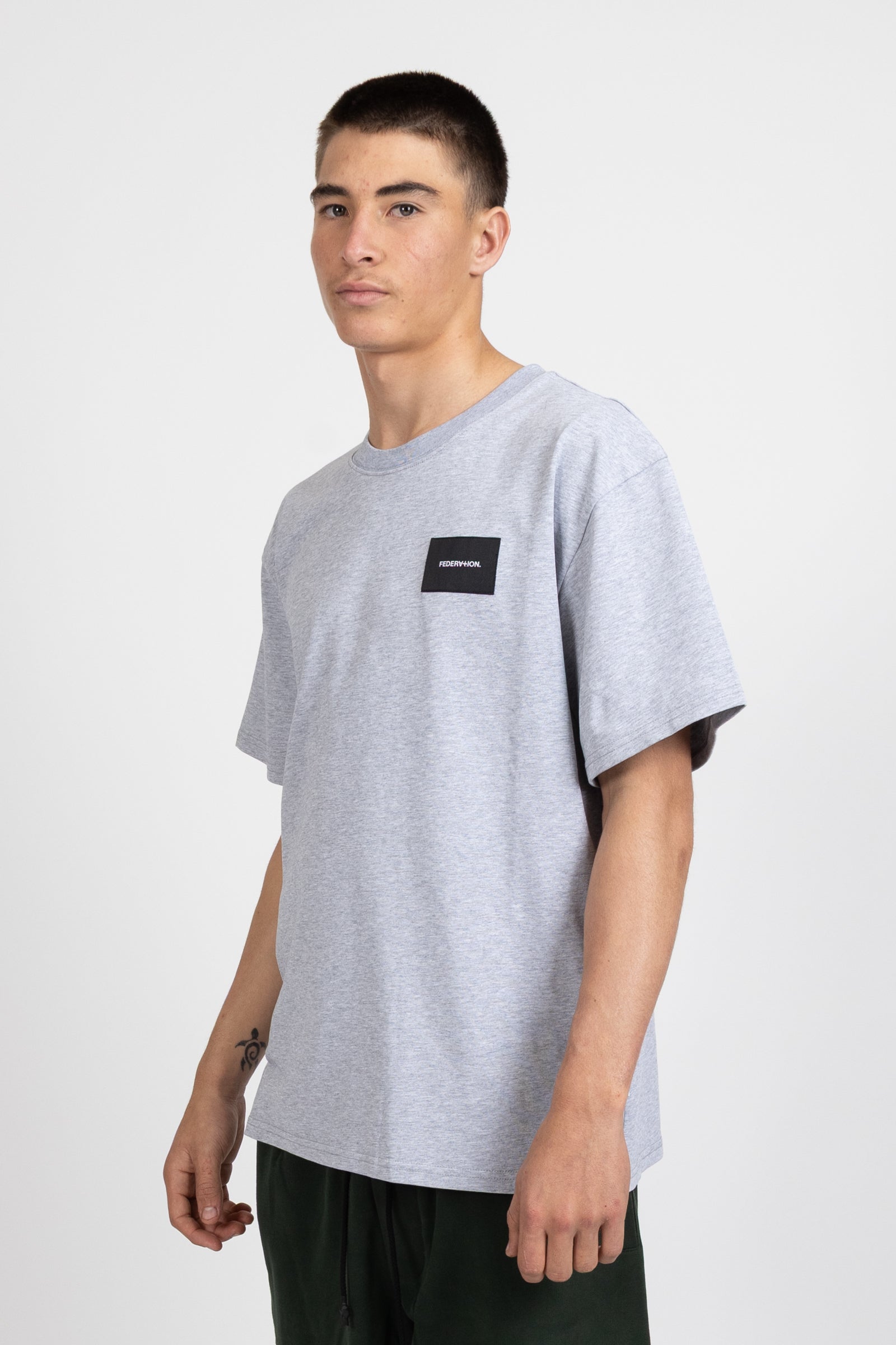 Tour Tee - Woven Badge